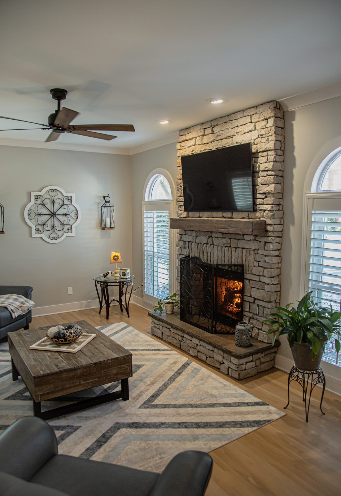 Living room with stone fireplace