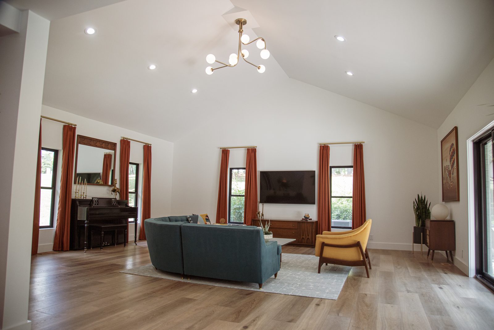 Bright, light-filled living room with vaulted ceiling